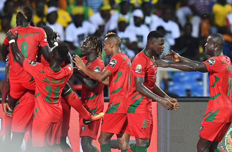 Guinea-Bissau’s players celebrate after Soares got a late equaliser. Photograph: Gabriel Bouys/AFP/Getty Images