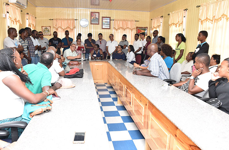 GRA Commissioner-General Godfrey Statia makes a point on Saturday during a meeting with miners in Bartica. Also in photograph is Minister within the Ministry of Natural Resources Simona Broomes. (Kawise Wishart)