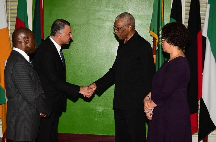 Non-Resident Ambassador of the Republic of Egypt to Guyana, Alaaeldin Wagih Roushdy, introduces himself to President Granger, flanked by Minister of Foreign Affairs, Mr. Carl Greenidge and Director General in the Ministry of Foreign Affairs, Ambassador Audrey Waddell