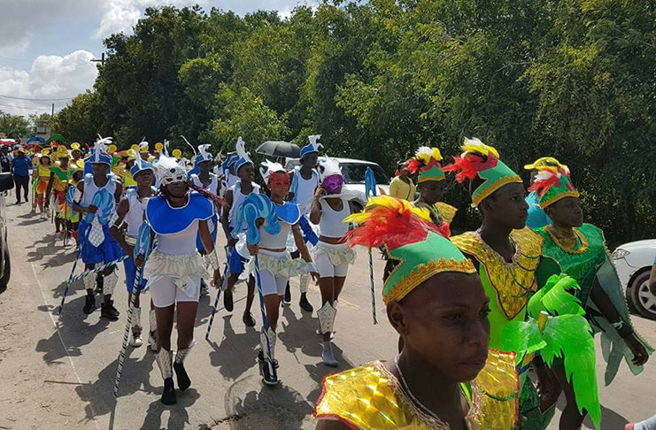 Some of the young revellers moving
through the main thoroughfare of New
Amsterdam during the Mashramani Float
and Costume Parade on Sunday (Photo
taken from junior Education Minister
Nicolette Henry’s Facebook page)