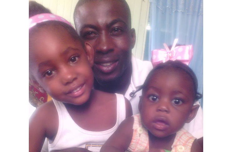 DEAD: Lenard Pollard and his two daughters in happier times. At right is 18-month-old Nakasia, who perished in the fire