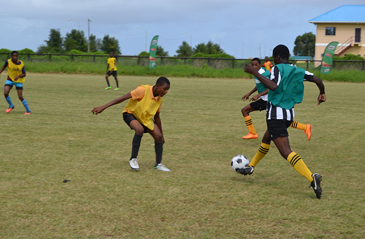 Flashback! Action last week in the MoPH/Milo schools U-18 Football tournament. (Stephan Sookram photo)