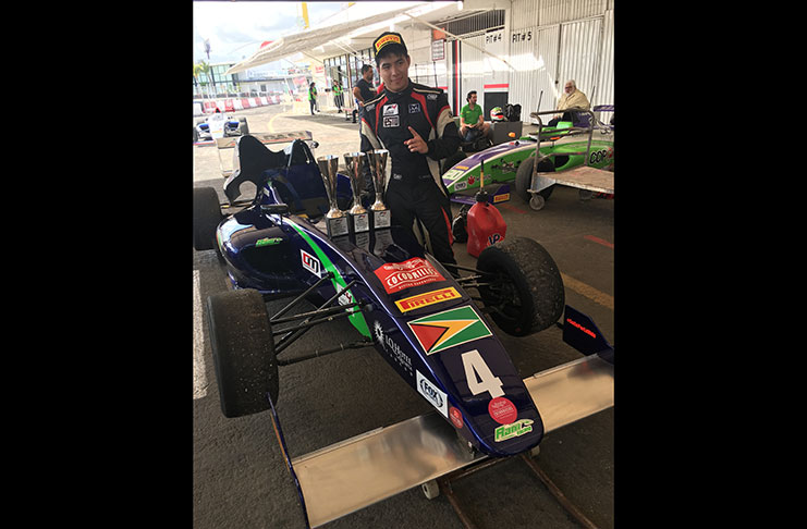 Calvin Ming poses with his three trophies on his F4 Car following another successful performance in Mexico.
