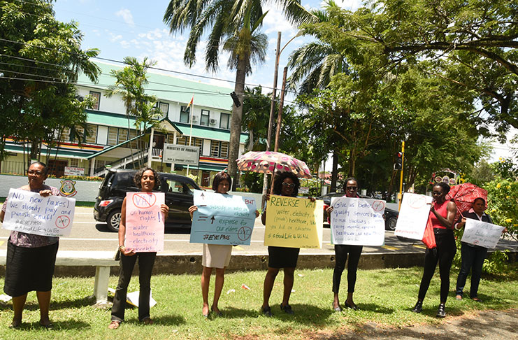 A section of the group which staged a peaceful protest in front of the Ministry of Finance on Tuesday, against the imposition of new tax measures by the Government