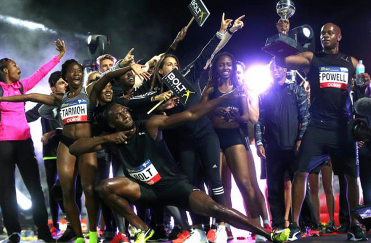 Jamaica's Olympic champion Usain Bolt celebrates with team mates during the final night of the Nitro Athletics series at the Lakeside Stadium in Melbourne, Australia.. REUTERS/Hamish Blair
