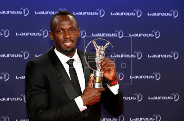 Jamaican sprinter Usain Bolt poses with the Laureus Sportsman-of-the-Year award at the Laureus Sport Awards in Monaco, yesterday.