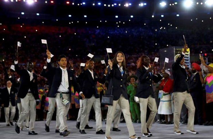 Olympics refugee team arrives at the Marcana Stadium for the opening ceremony in the 2016 Rio Olympics. (REUTERS/Kai Pfaffenbach)