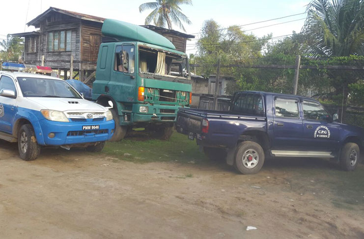 The CPG vehicle (left) that is impounded at Number 51 Police Station