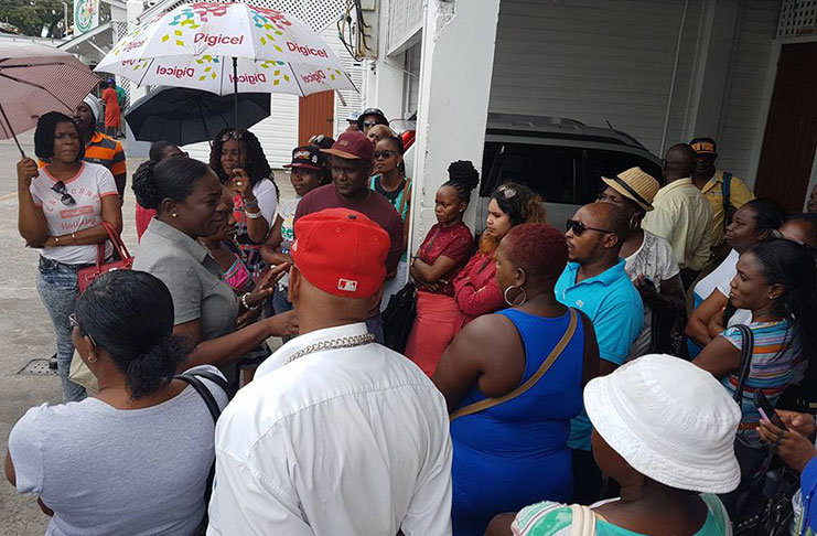 Minister Nicolette Henry meeting with vendors on the issue of Mash Day vending