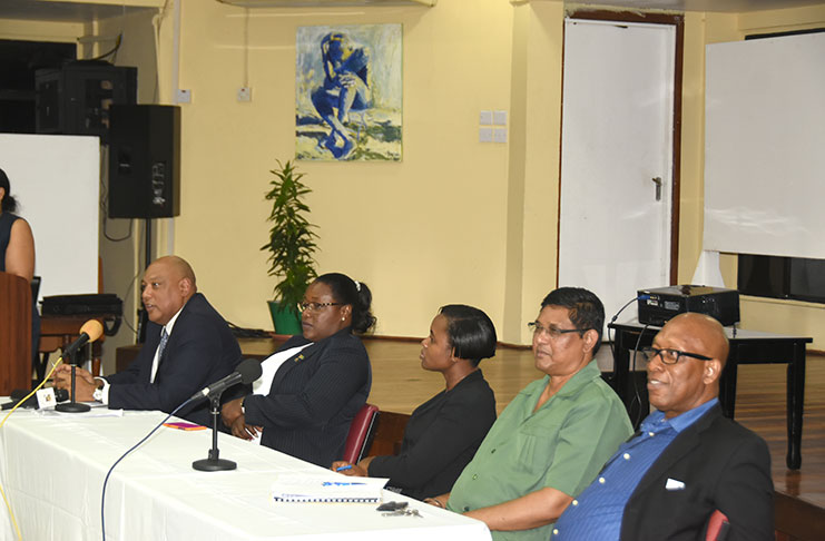From left Minister Trotman and Junior Minister, Broomes and other officials during the presentation on the oil and gas sector at the University of Guyana