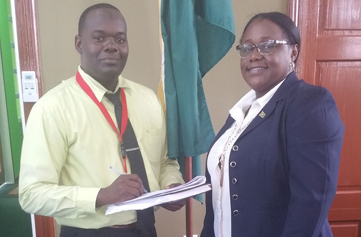 Minister within the Ministry of the Natural Resources, Ms Simona Broomes during her meeting with Labour, Occupational, Safety and Health Officer, Mr Roydon Croal