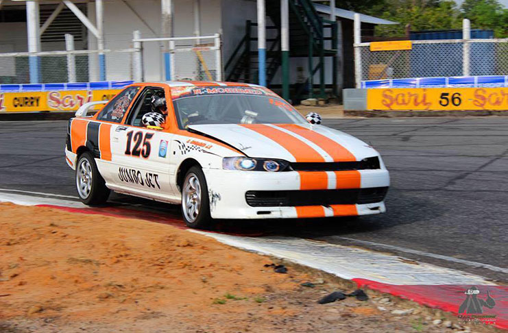 Nasrudeen Mohamed’s Toyota rounds the clubhouse bend during a qualifying session last year.