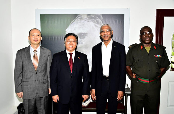From left: Deputy Chief of Mission, Mr. Yang Chenqi, China’s Ambassador to Guyana, Mr. Cui Jianchun, President David Granger and Chief of Staff of the Guyana Defence Force, Mr. Patrick West