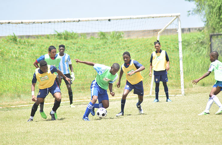 This Cullen Bess-Nelson photo shows the last of the group stage games in the Milo schools football tournament last weekend.