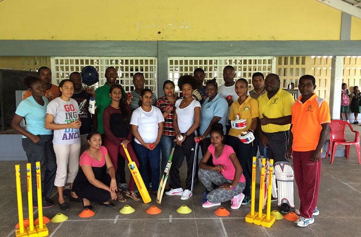 The participants, along with coach Latchman Yadram and sports organisers Lester Griffith and Marlon Whitney, pose for a photo at the conclusion of the course.