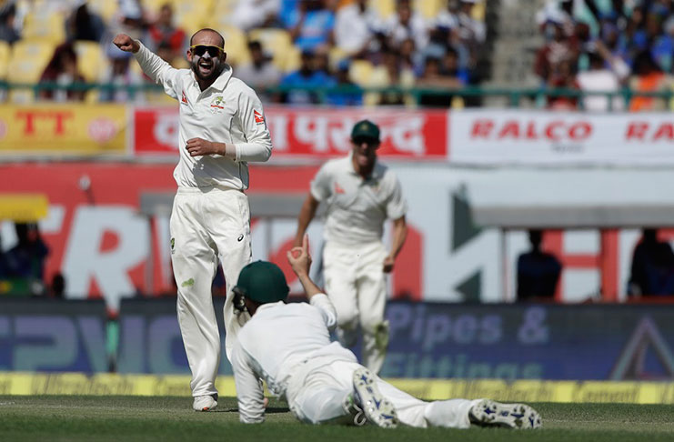 Off-spinner Nathan Lyon had Cheteshwar Pujara caught at short leg for 57 on the second day.