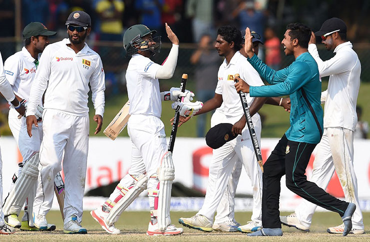Bangladesh celebrate their landmark victory over Sri Lanka in Colombo.