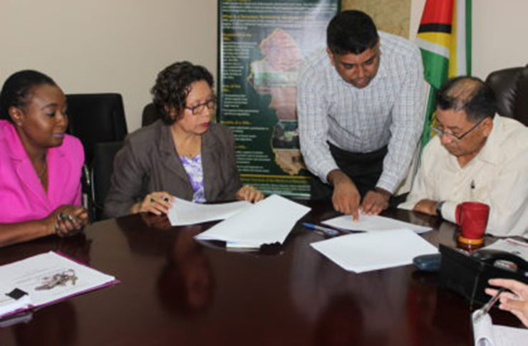 (L-R) Deputy Permanent Secretary, Samantha Fedee, Minister within the Ministry of Indigenous People’s Affairs, Valerie Garrido-Lowe, Representative of Kalitech Inc. Engineering Design and Supervisory Consultants and Vice-President and Minister of Indigenous Peoples' Affairs, Sydney Allicock in discussion (Ministry of Indigenous Affairs photo)