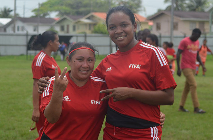 Paiwomak's double-striker Samantha Roberts (L) and 'rock-solid' defender Gillian Hawker pose for a picture after their semi-final win