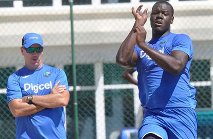 Head coach Stuart Law watches all-rounder Carlos Brathwaite during a recent net session.