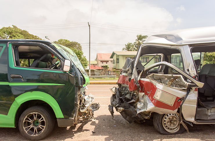 The minibuses that were involved in Sunday’s accident on Le Ressouvenir Public Road (Photos by Samuel Maughn)