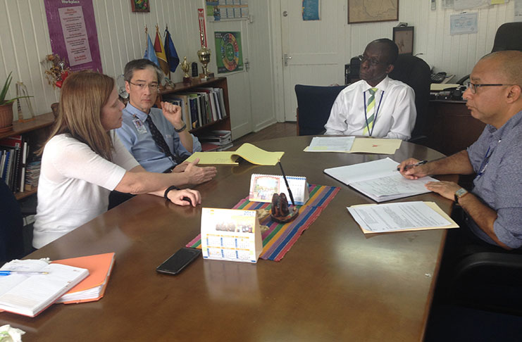 From left: Gillian Battino, Berndt Schmit, Dr William Adu-Krow of PAHO/WHO and Dr Paul Edwards, Director,Health Systems and Services,also of PAHO/WHO