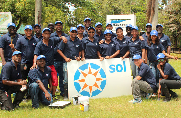 Sol Guyana employees in the Botanical Gardens
