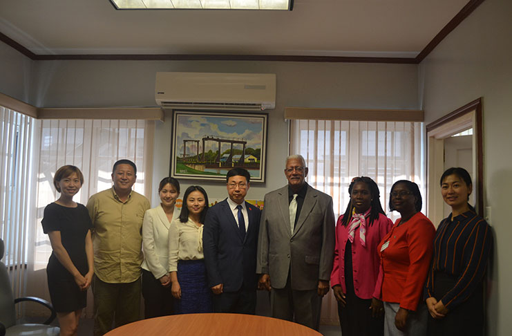 Agriculture Minister, Noel Holder and officials from the Chinese Embassy and his ministry