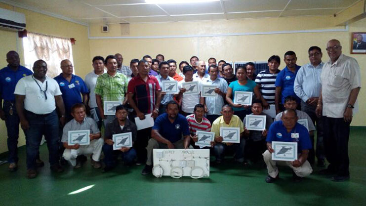 Trainees pose with GWI officials, including Managing Director, Dr Richard Van-West Charles