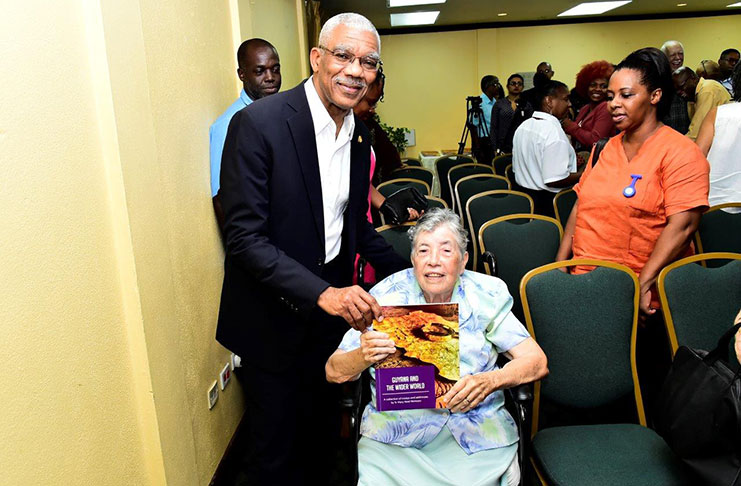 President Granger posed for a picture with his former History lecturer, the 87-year old Sister Mary Noel Menezes holding a copy of her book