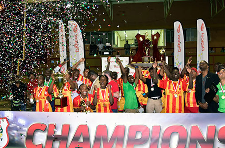 FLASHBACK! Chase’s Academic Foundation celebrate their Digicel Schools Football title last year at the Guyana National Stadium.