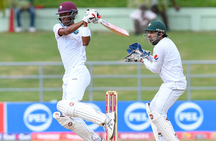 Roston Chase pulls a short ball during his innings before retiring hurt on 60. (WICB photo)