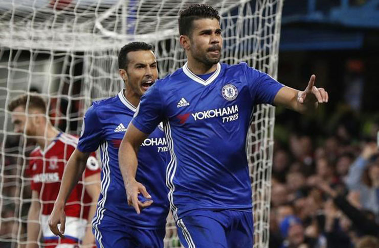 Chelsea's Diego Costa celebrates scoring their first goal with Pedro. (Action Images via Reuters/John Sibley)