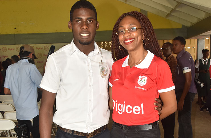 Jeremy Garrett (left) and Digicel Head of Marketing Jacqueline James at the launching of the 2017 Digicel Schools Football Championship yesterday. (Adrian Narine photo)