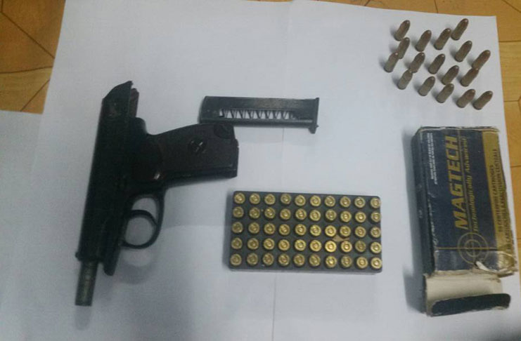 The unlicensed .32 pistol with 50 matching rounds and 17 live 9mm rounds seized on Saturday from the premises of the Mahaica businessman