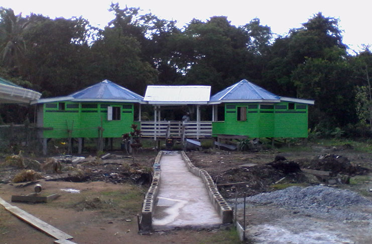 Unfinished houses at the riverside resort