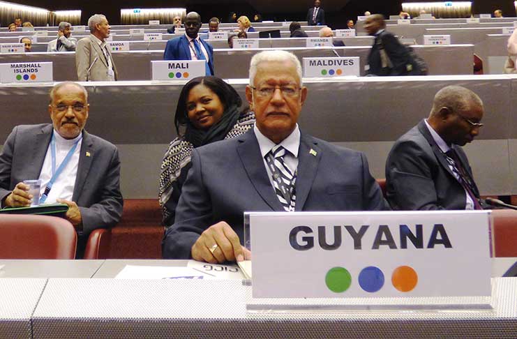 Minister Holder and other officials at the conference.