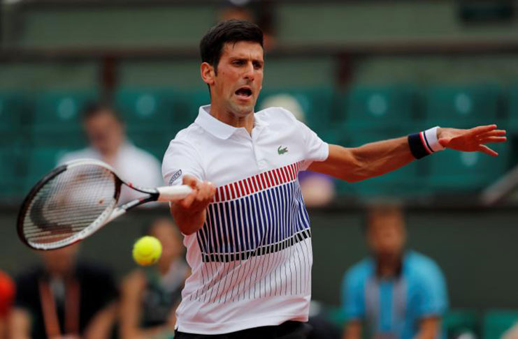 Serbia's Novak Djokovic in action during his first round match against Spain's Marcel Granollers. (Reuters/Gonzalo Fuentes)