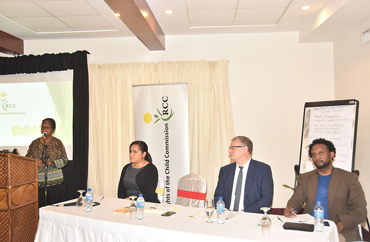 Ms. Indra Chandarpal making her presentation Monday at the RCC workshop. Seated from left are: An RCC member, Ambassdor Jernej Videtic, and Mr. Ruel Johnson