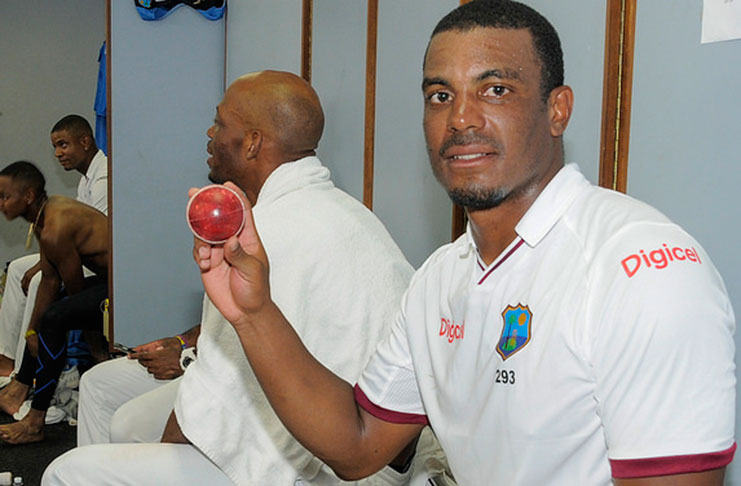 Shannon Gabriel poses with the match ball inside the dressing room after destroying Pakistan with  impressive figures of  of 5 for 11 in the second innings and a match haul of 9 for 92. (Photo by WICB Media/Randy Brooks of Brooks Latouche Photography)