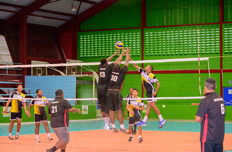 Action in the DVA’s First Division League’s opening night play at the National Gymnasium (Samuel Maughn Photo)