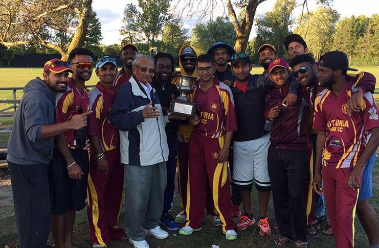 FLASHBACK: Victoria Park Cricket Club players and officials celebrate their Elite League triumph last season.