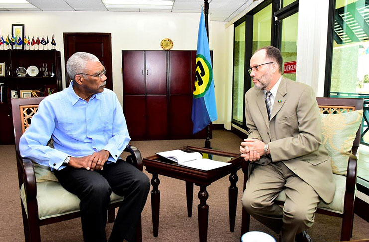 President David Granger made his first visit to the CARICOM Secretariat since taking office today to Chair a meeting of the Bureau of the Conference of Heads of Government via video conference.  The Head of State is pictured here with Secretary- General of CARICOM, Ambassador Irwin LaRocque (MoTP photo)