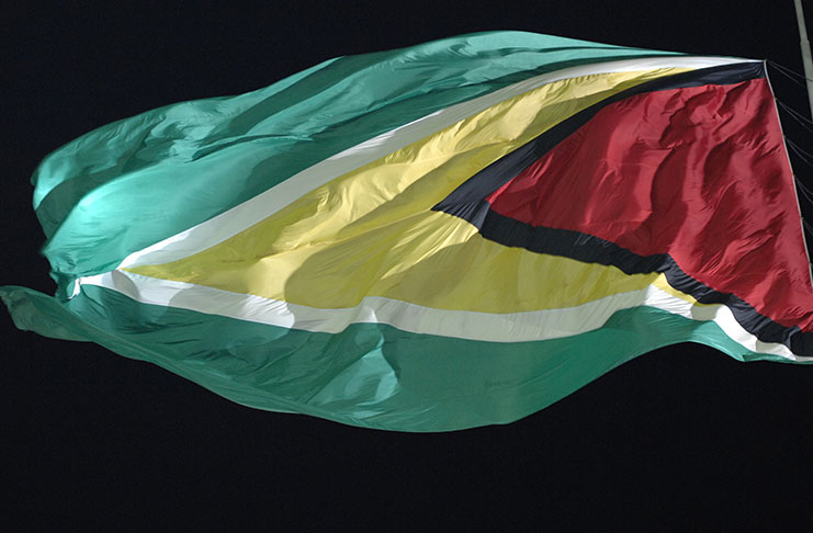 The Golden Arrowhead flutters in the midnight sky as Guyana ushered in its
51st anniversary as an Independent nation at D’Urban Park (Adrian Narine
photo)