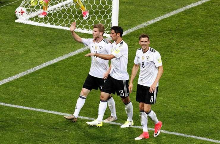 Germany’s Timo Werner (L) celebrates scoring their third goal with Lars Stindl (C) and Leon Goretzka (R). (REUTERS/Maxim Shemetov)