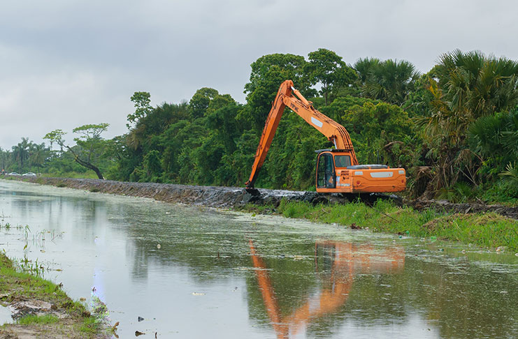 The Canal at North-East La Penitence being de-silted.
