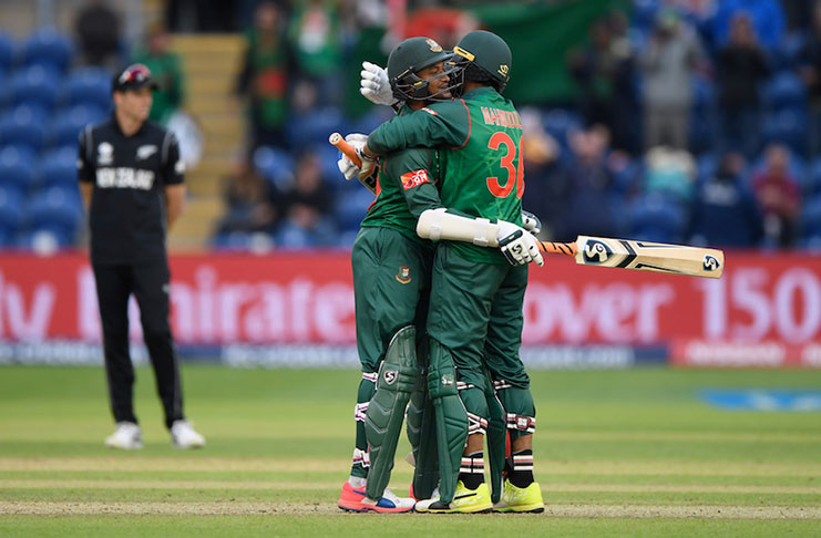 Mahmudullah and Shakib Al Hasan embrace during their record stand, against New Zealand  at Cardiff  last Friday.