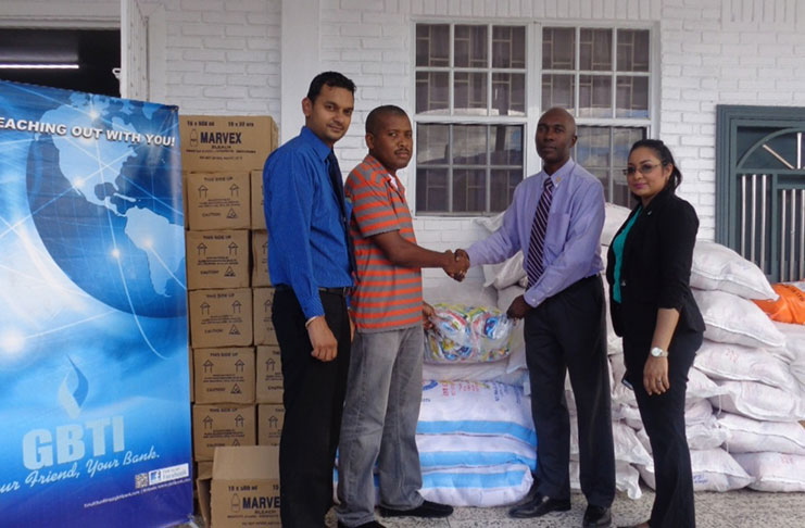 (L to R)Senior Manager GBTI, Finance, Shawn Gurcharran; Administrative Officer for the Civil Defence Commission (CDC), Marvin Chichester; Senior Manager GBTI, Administration, Sean Noel and Public Relations and Marketing Manager GBTI, Pamela Binda.