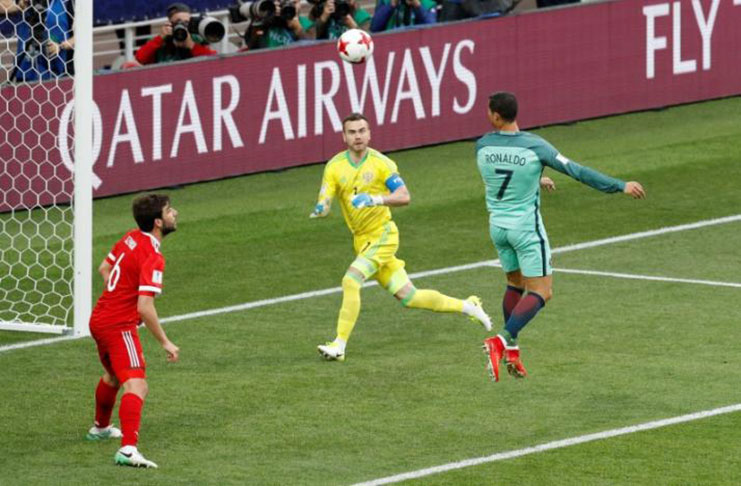 Portugal’s Cristiano Ronaldo heads at goal. (REUTERS/Darren Staples)