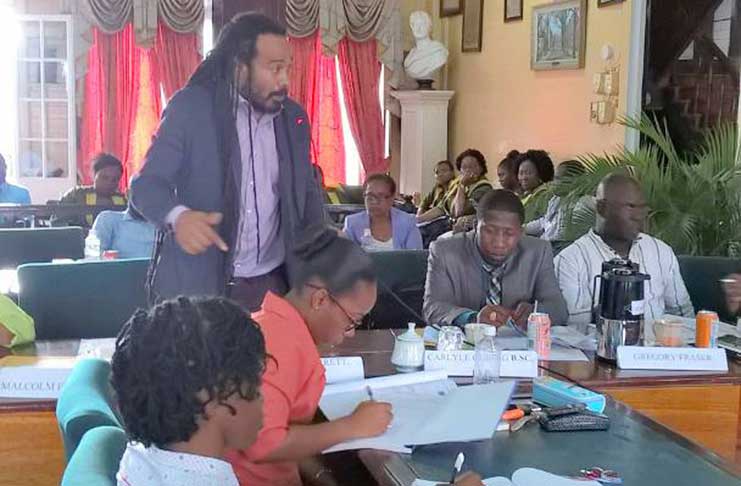 Councillor Malcolm Ferreira (standing) makes a point